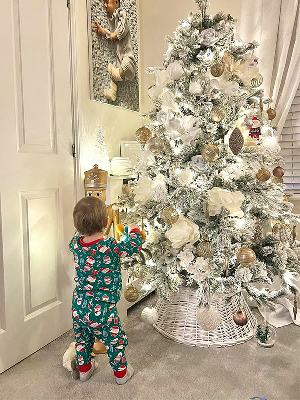 decorating christmas tree in white